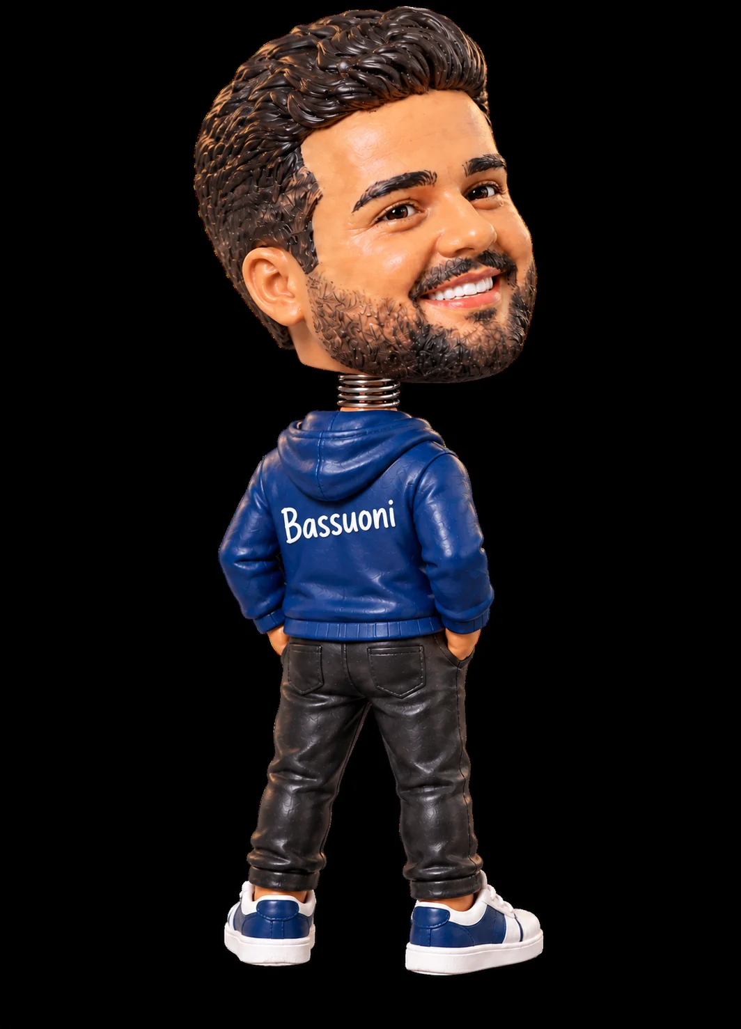 Mahmoud Bassuoni’s bobblehead figure looking back over his shoulder
